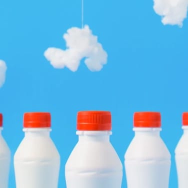 Fourn milk bottles